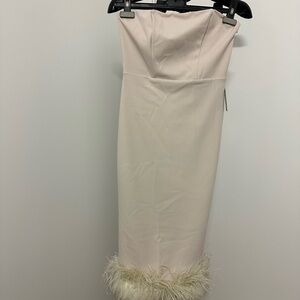 New Express  dress with bottom feathers. Cream color.Xs